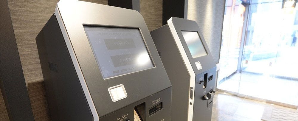 Mesin daftar masuk dan daftar keluar