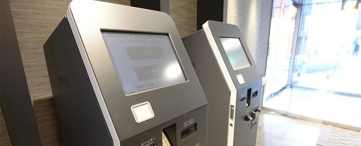 Mesin daftar masuk dan daftar keluar