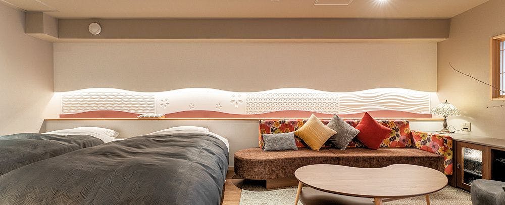 ห้องพักชั้นบนสุดพร้อมน้ำพุร้อน