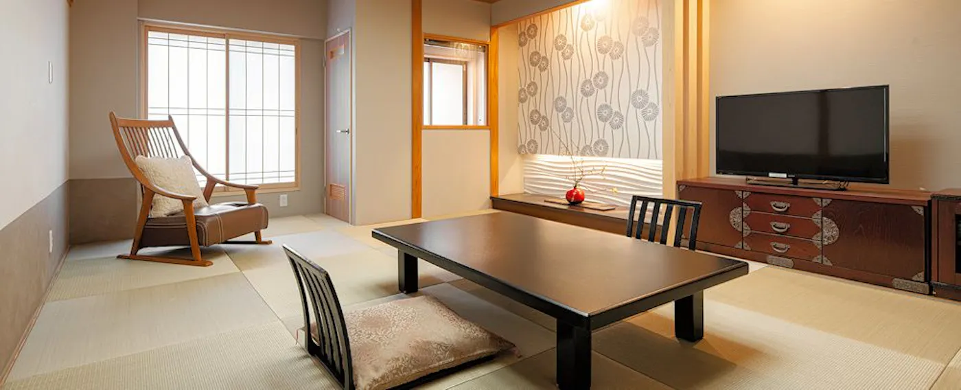 ห้องพักชั้นบนสุดพร้อมน้ำพุร้อน