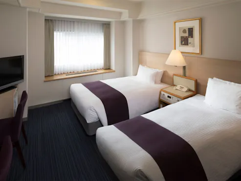 ห้องพักเตียงคู่มาตรฐานอาคารเสริม (21 ตร.ม.)