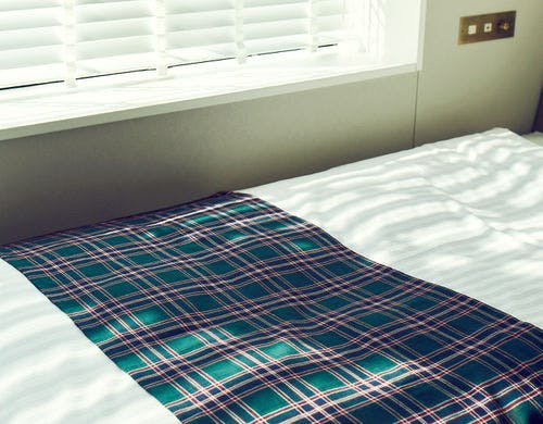 トリプルルームのベッド