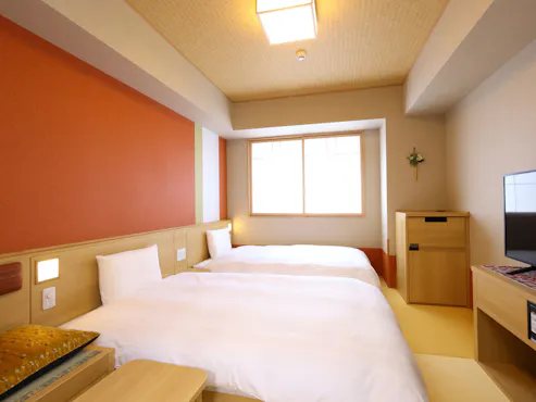 22,4 m² (tempat tidur 120×195 cm × 2 unit)