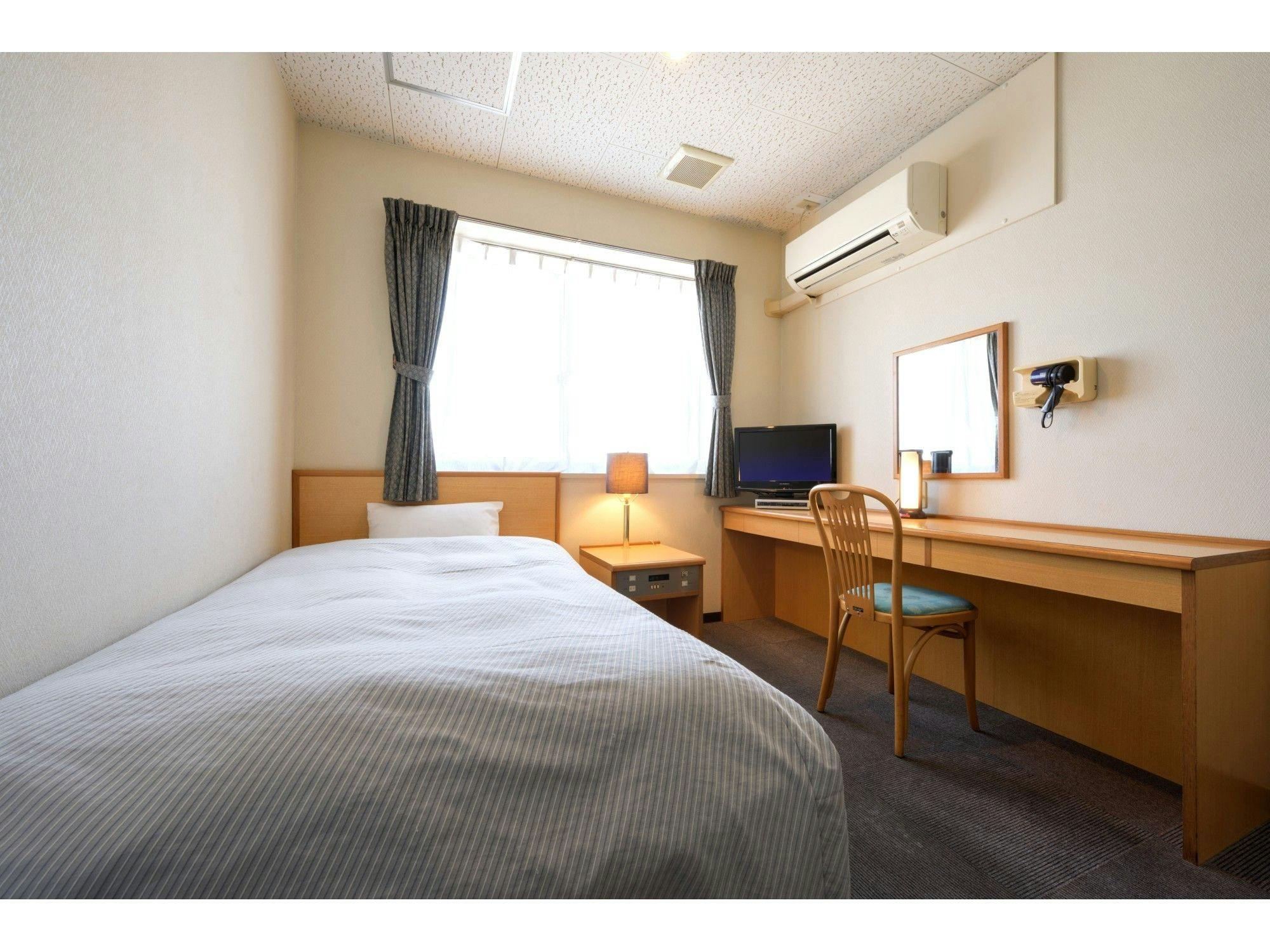 ห้องพักแบบเดี่ยวสไตล์ตะวันตกในอาคารหลัก