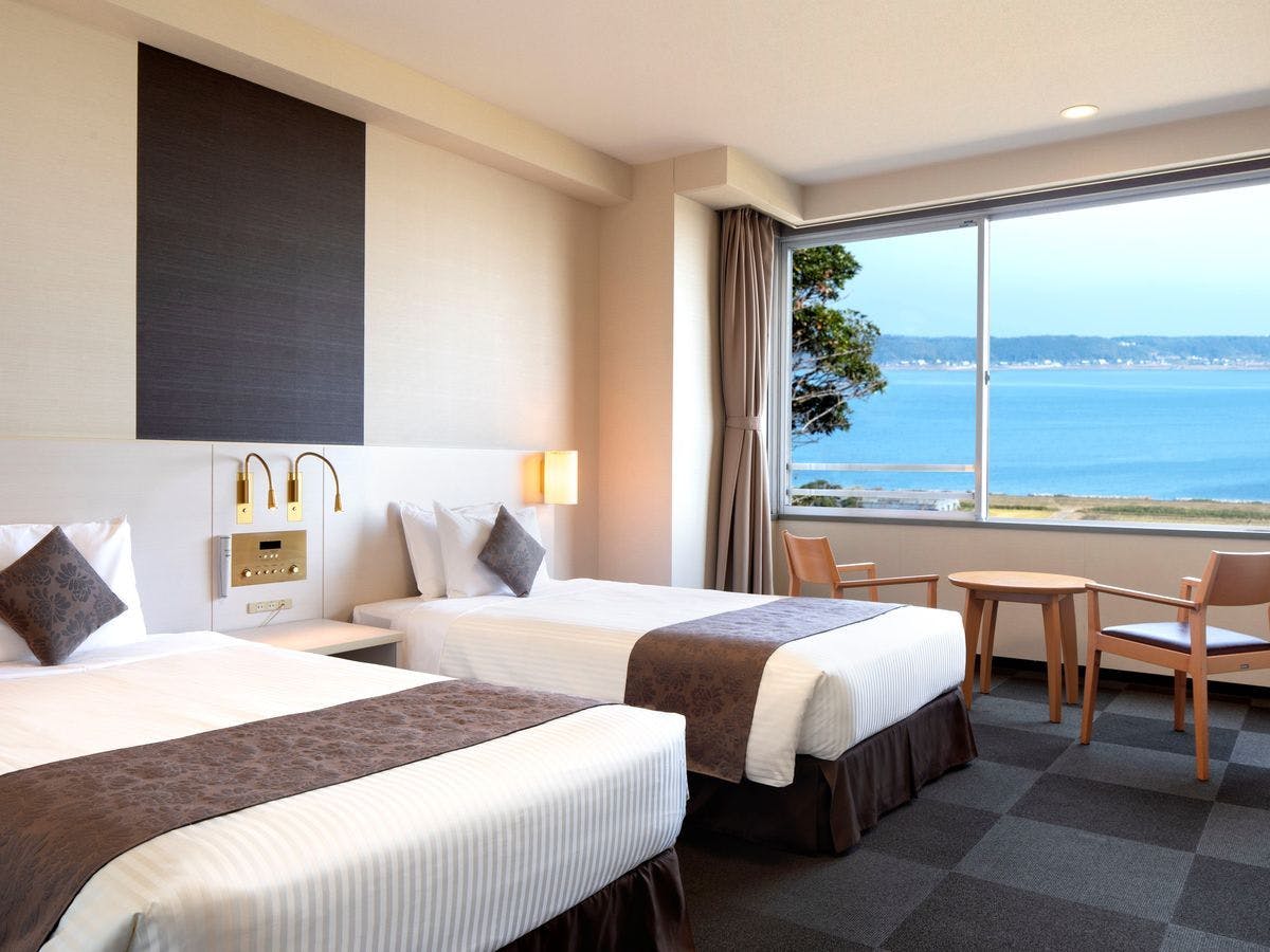 Standard Twin/28 meter persegi (tanpa tab mandi)