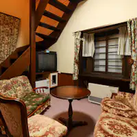 ห้องพักแบบสามเตียงพร้อมชั้นลอย