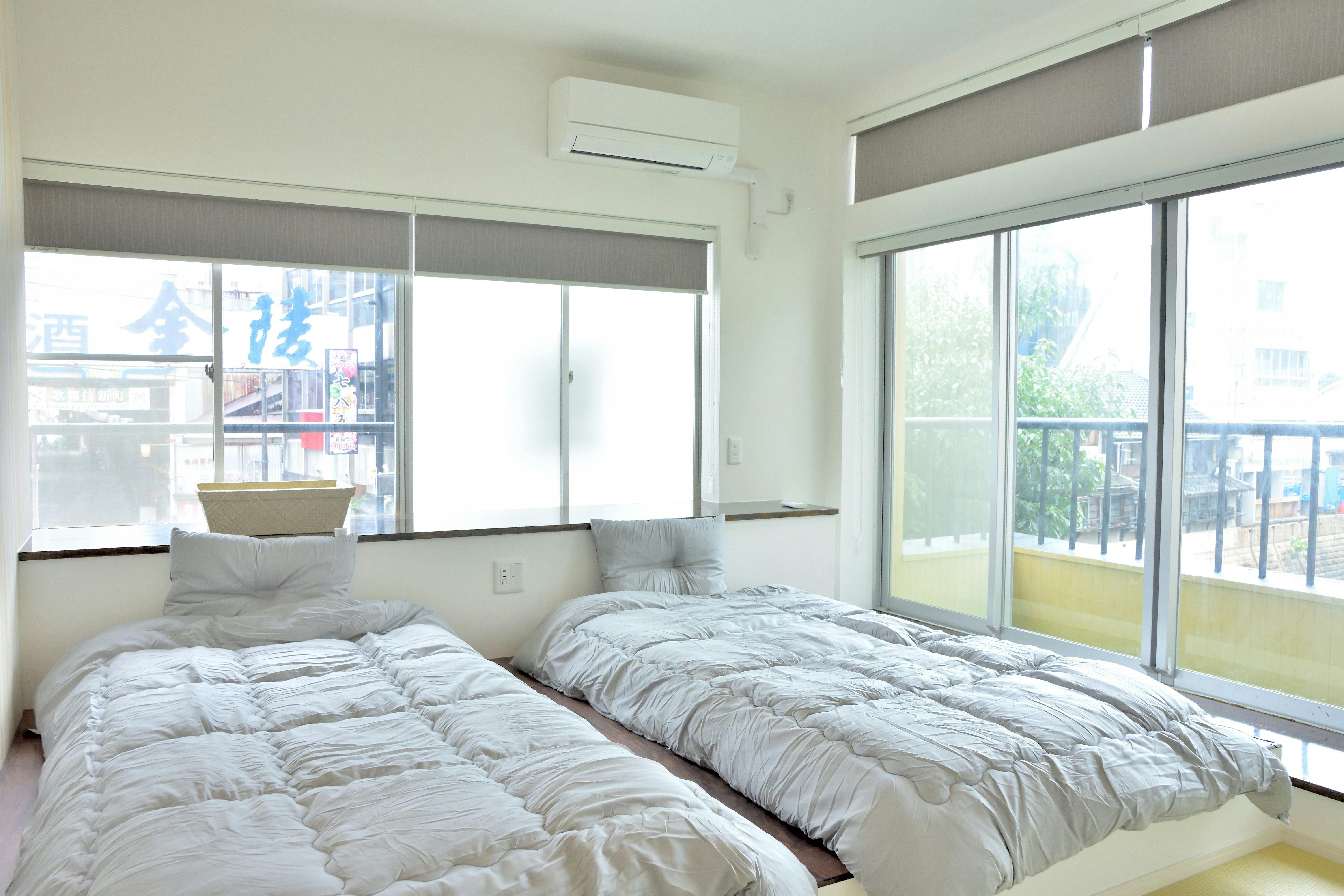 ห้องพักสไตล์ญี่ปุ่นและตะวันตกพร้อมระเบียง