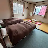 2 tempat tidur single, area tatami 4 jo