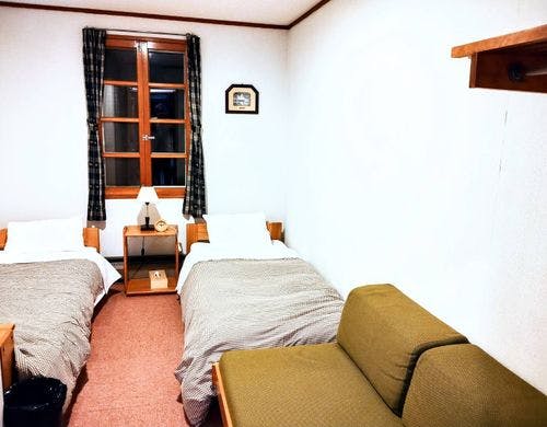 洋室ツイン／洗面化粧台・トイレ付き