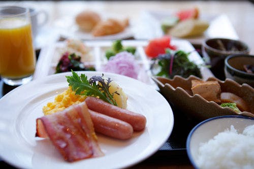 A breakfast buffet featuring a vibrant and colorful menu.