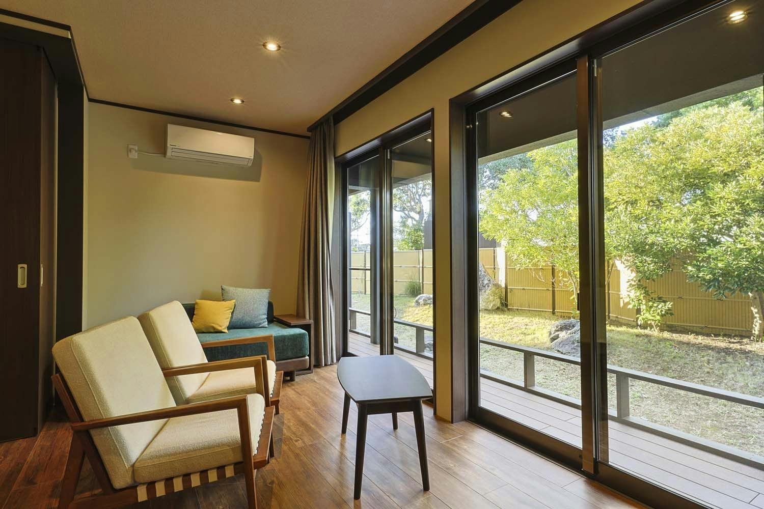 ห้องพักพร้อมอ่างอาบน้ำ น้ำพุร้อน กลางแจ้งที่มองเห็นสวน