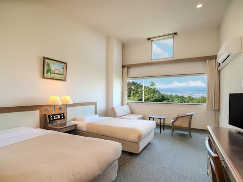 34平米のゆったりとした洋室ツインです。