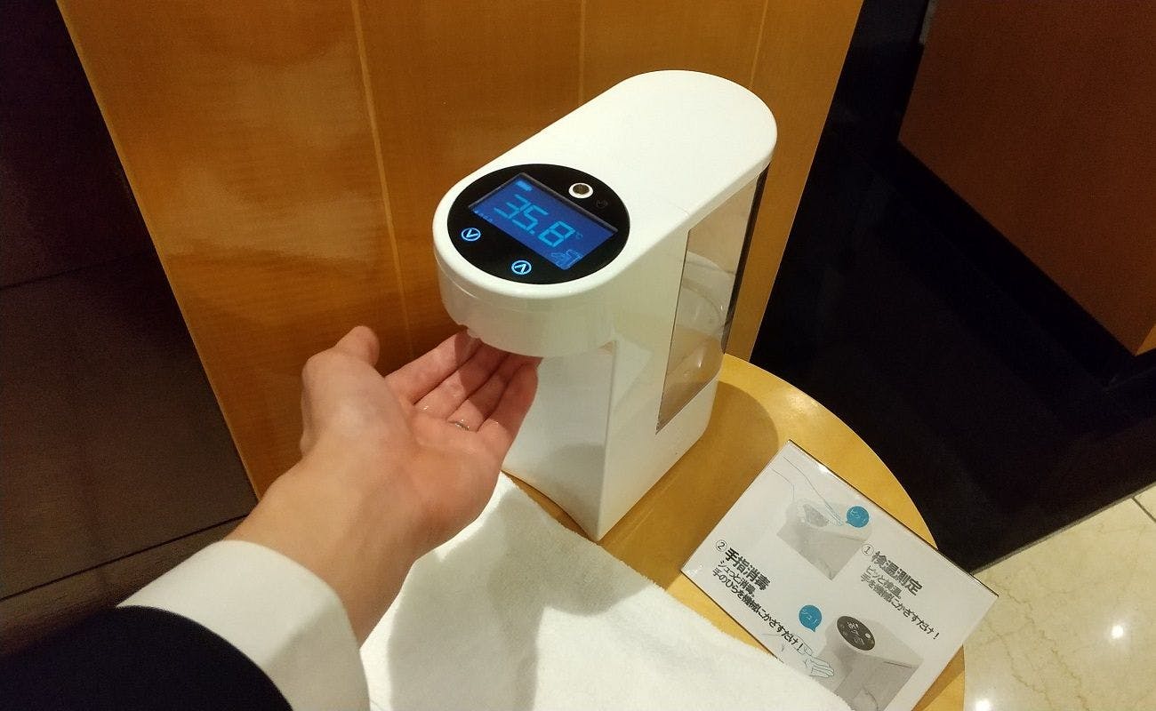 チェックインの際には、消毒と検温を