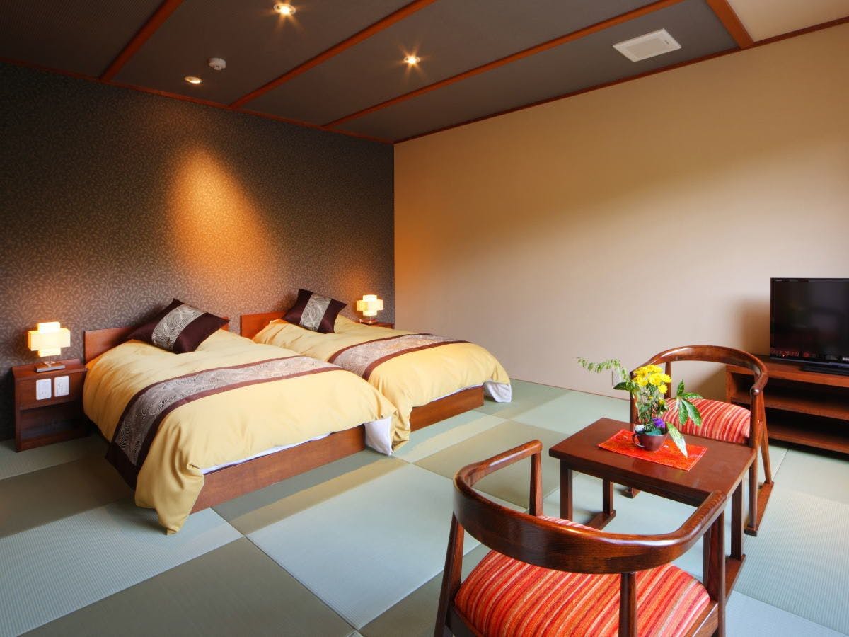 อาคารเสริม ห้องพักสไตล์ญี่ปุ่นและตะวันตก (10 เสื่อทาทามิ & เตียงคู่)