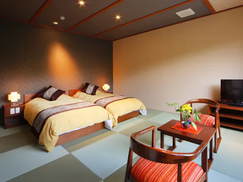 อาคารเสริม ห้องพักสไตล์ญี่ปุ่นและตะวันตก (10 เสื่อทาทามิ & เตียงคู่)