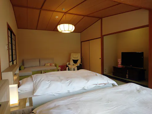 ห้องพักแบบญี่ปุ่นเตียงคู่พร้อมเก้าอี้นวด