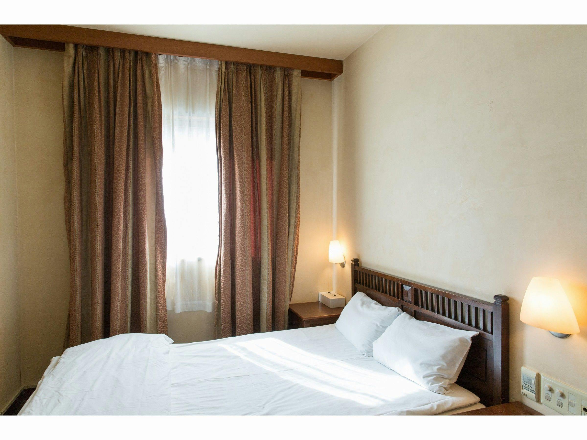 เตียงห้องพัก