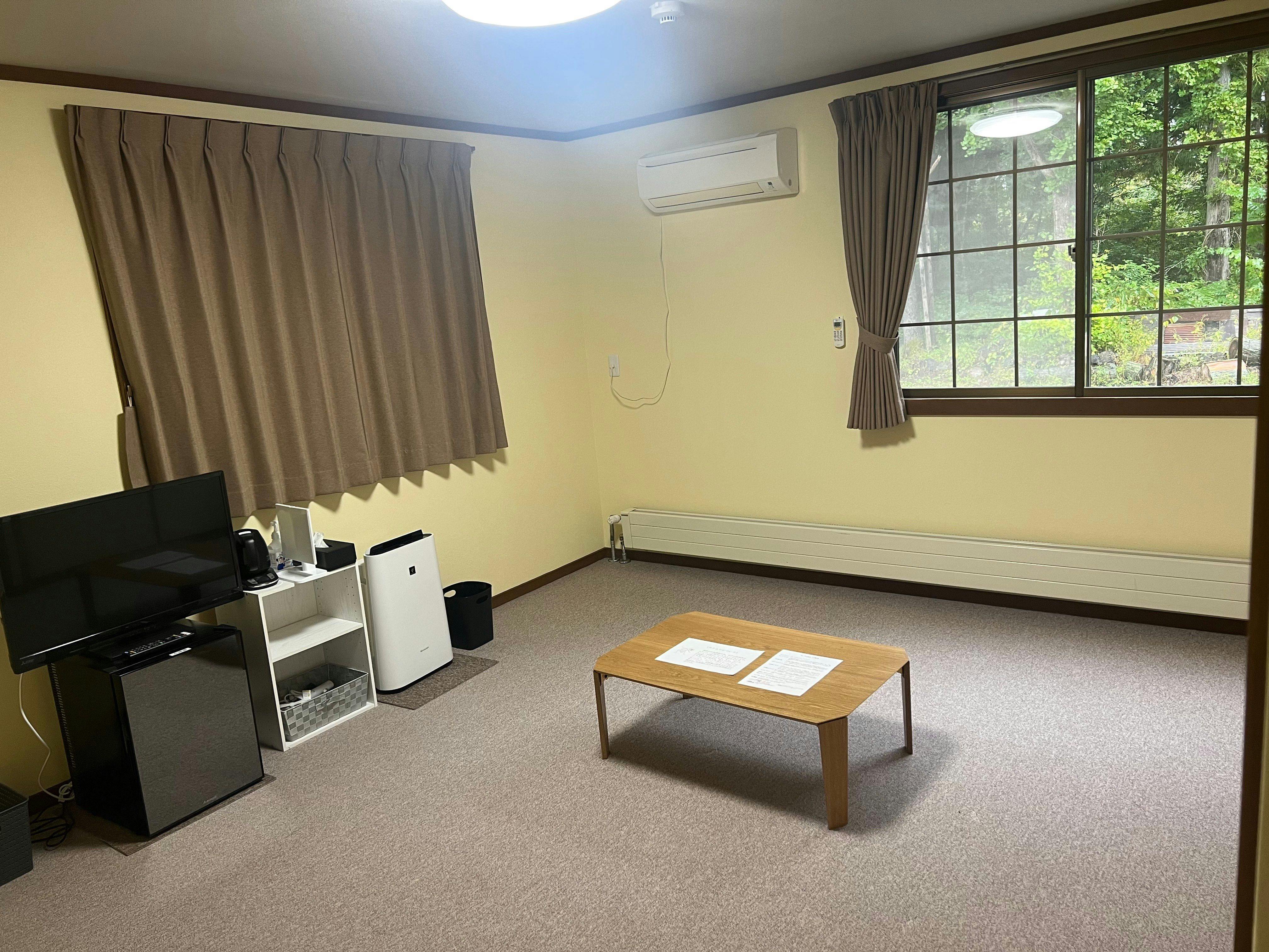 ห้องพักปูพรมสไตล์ตะวันตก (10 เสื่อทาทามิ) ชั้นใต้ดิน