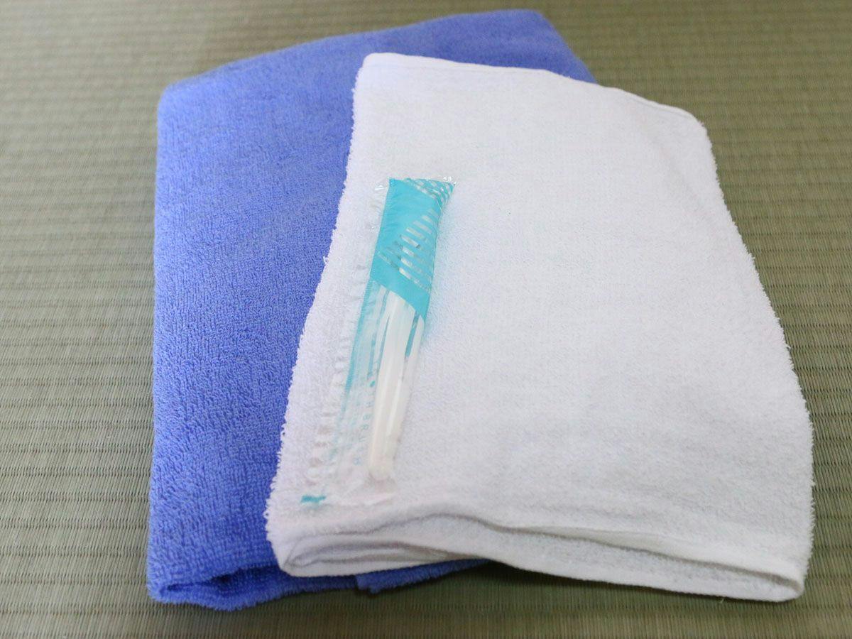 Face towels and toothbrushes are provided.*