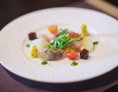 熟成魚のカルパッチョ　季節の野菜を添えて