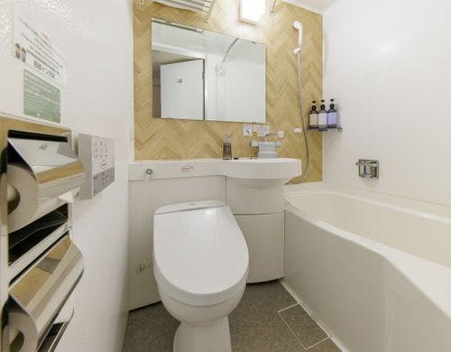 広さ12平米、ベッドはセミダブルベッド