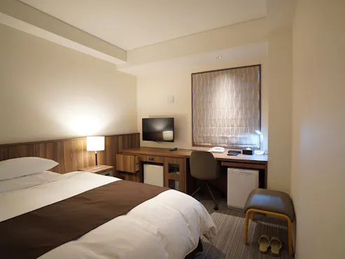 Menggunakan tempat tidur Simmons 130cm