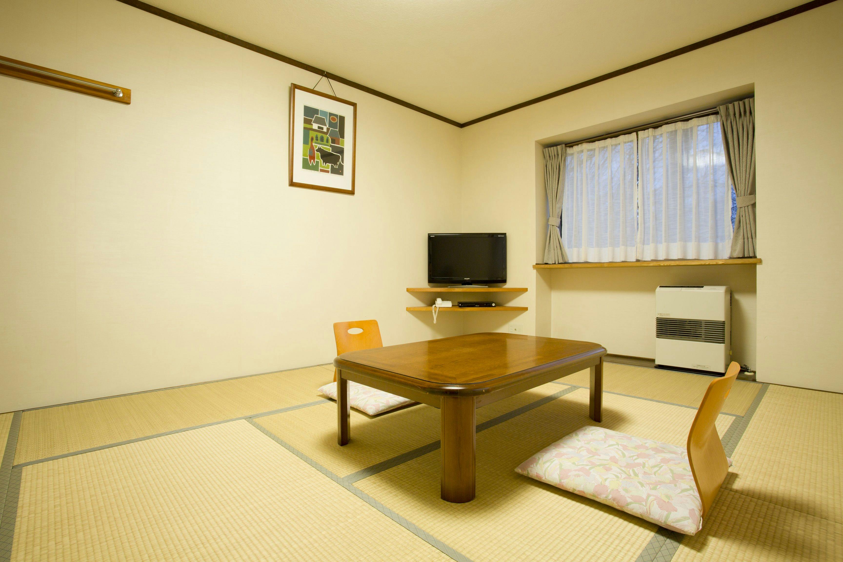 Hakuba Skala Inn ~ A Lodge in the Forest and a Small Bakery ~