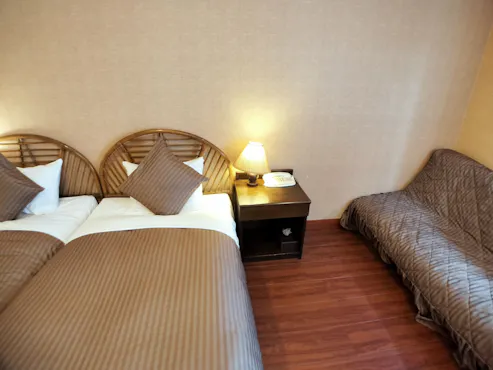 Kamar Deluxe Twin (Untuk 2-3 orang)