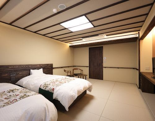 ■温泉内風呂・ツインベッド付和室※一例