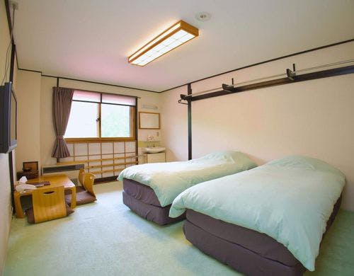 和室（じゅうたん敷き・ベッド付き）