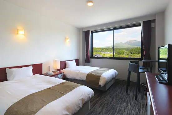 싱글 침대 2개와 유닛 욕실 포함.