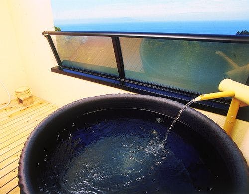 客室露天風呂一例（桧風呂）