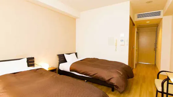 Kamar dengan dua tempat tidur