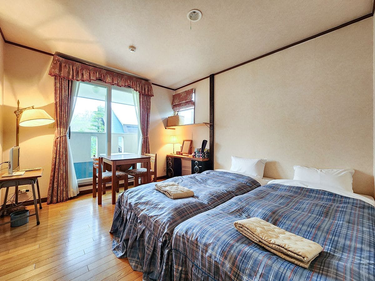 ห้องเตียงคู่พร้อมระเบียง