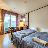 ห้องเตียงคู่พร้อมระเบียง