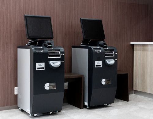 自動チェックアウト精算機