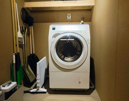 管理棟に洗濯機をご用意しております。