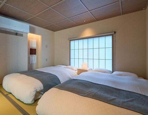 リビング直結の寝室、仕切ることも可能。