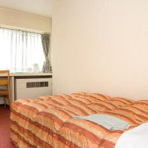 Kamar Single Kelas Tinggi