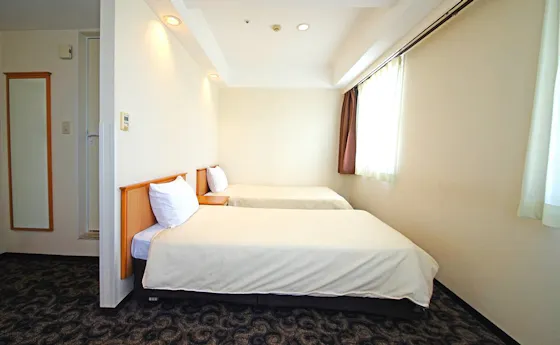 ห้องพักเตียงคู่ชั้นสูง (ปลอดบุหรี่)