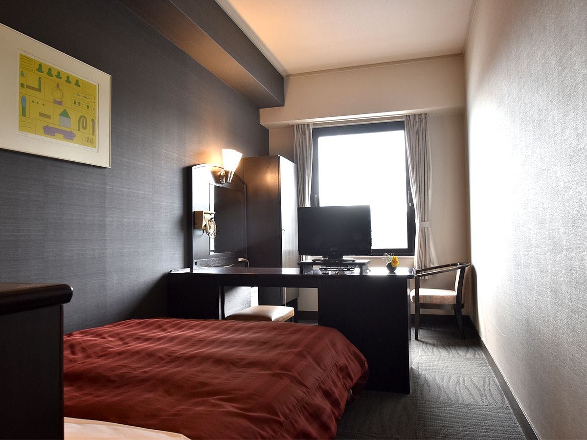 ห้องพักเดี่ยวขนาด 18 ตารางเมตรที่สะดวกสบาย.