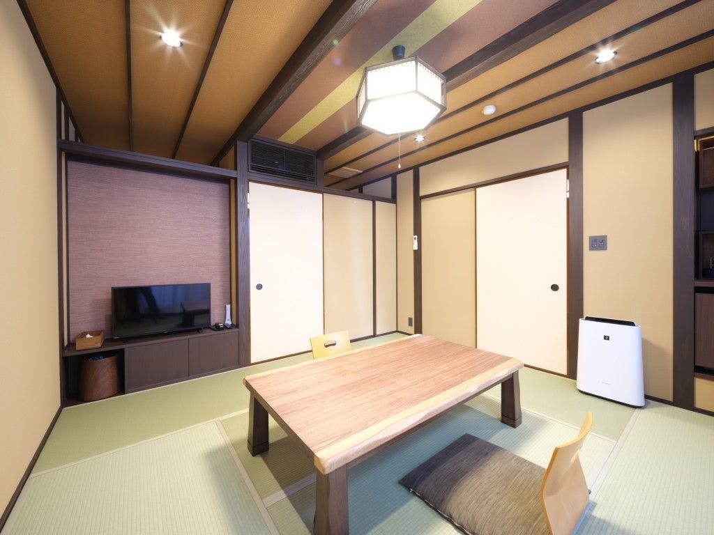 Kamar Khusus dengan Pemandian Semi Terbuka - Ruang Tamu