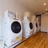 ซักรีดหยอดเหรียญ (มีค่าบริการ)