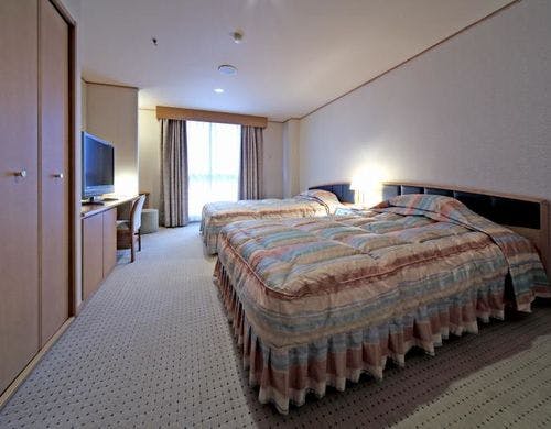 スイートルーム（川側・喫煙）ベッドルーム