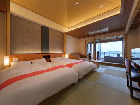 和室にベッドスタイルのモダン和洋室