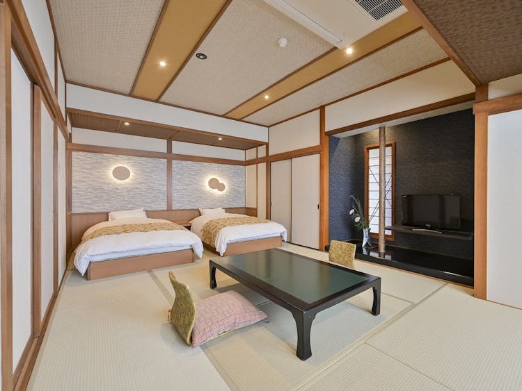 ベッド付和室12帖～禁煙～【白木館1階～shiraki～】のサムネイル画像