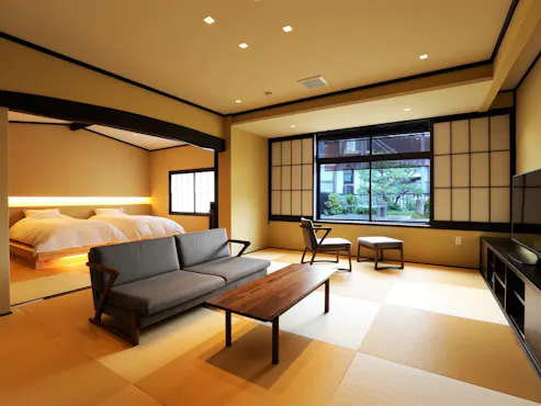 ห้องพักสไตล์ญี่ปุ่นและตะวันตกพร้อมระเบียงสวนที่มองเห็น Amanohashidate