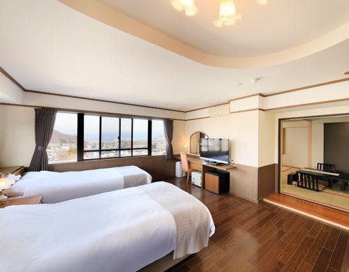 源泉かけ流し露天風呂付の和洋二間80平米