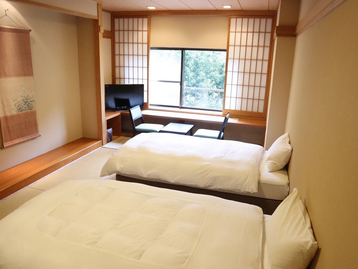 ห้องพักหลักสไตล์ญี่ปุ่น 10 เสื่อทาทามิ (มีเตียง) (ตัวอย่าง)