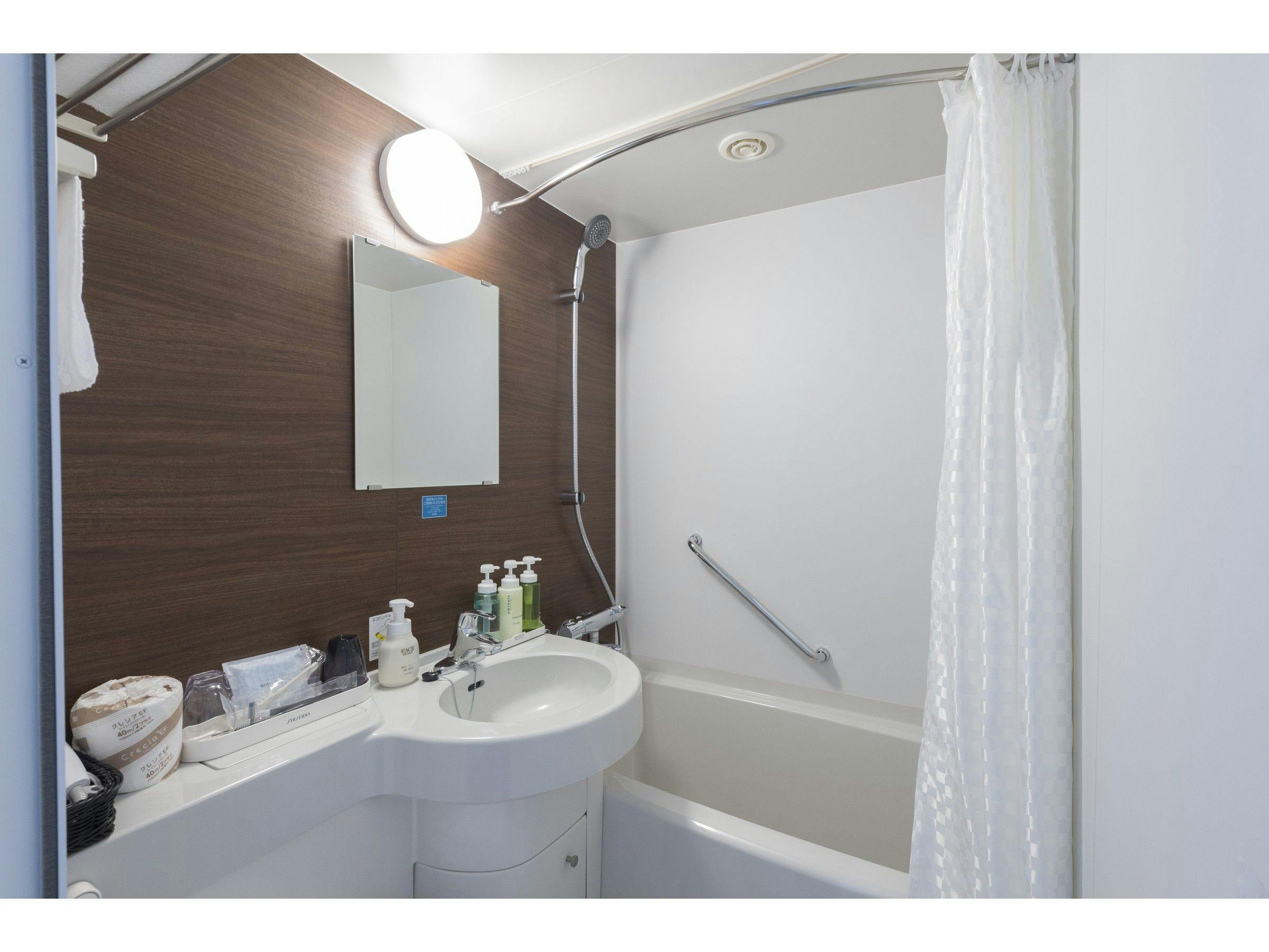 【バスルーム】Rカーテンパイプ採用